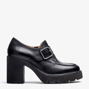 Mocassino nero in pelle modello Killen di Unisa con fibbia in metallo e tacco alto spesso su suola carro armato