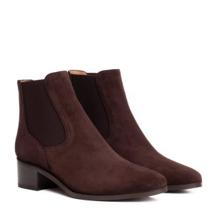 Dark brown suede ankle boots, Chelsea boot style, with a low heel and elasticated side panels.