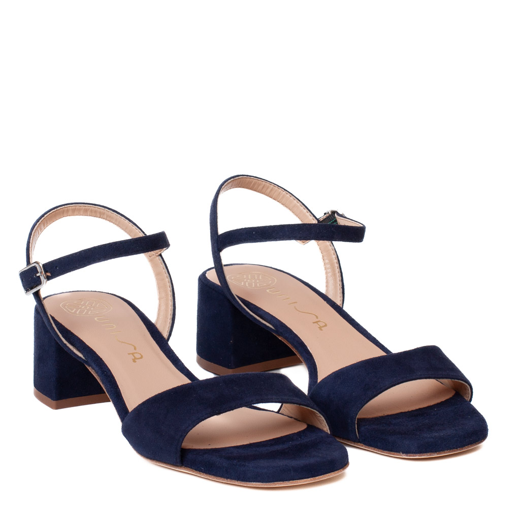 Unisa Kirk blue suede sandals with a low heel and an ankle strap.