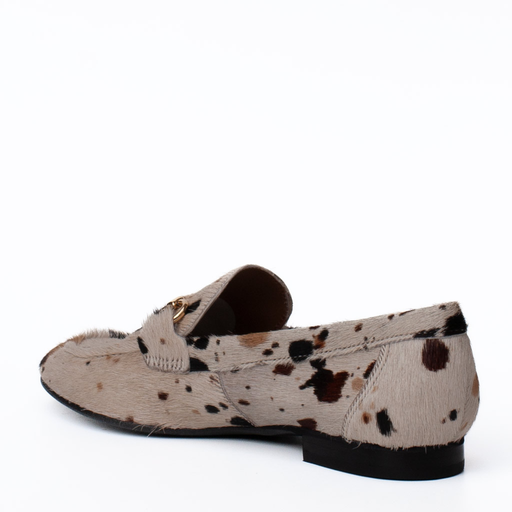 Cow-print pony-skin loafers with a gold clasp