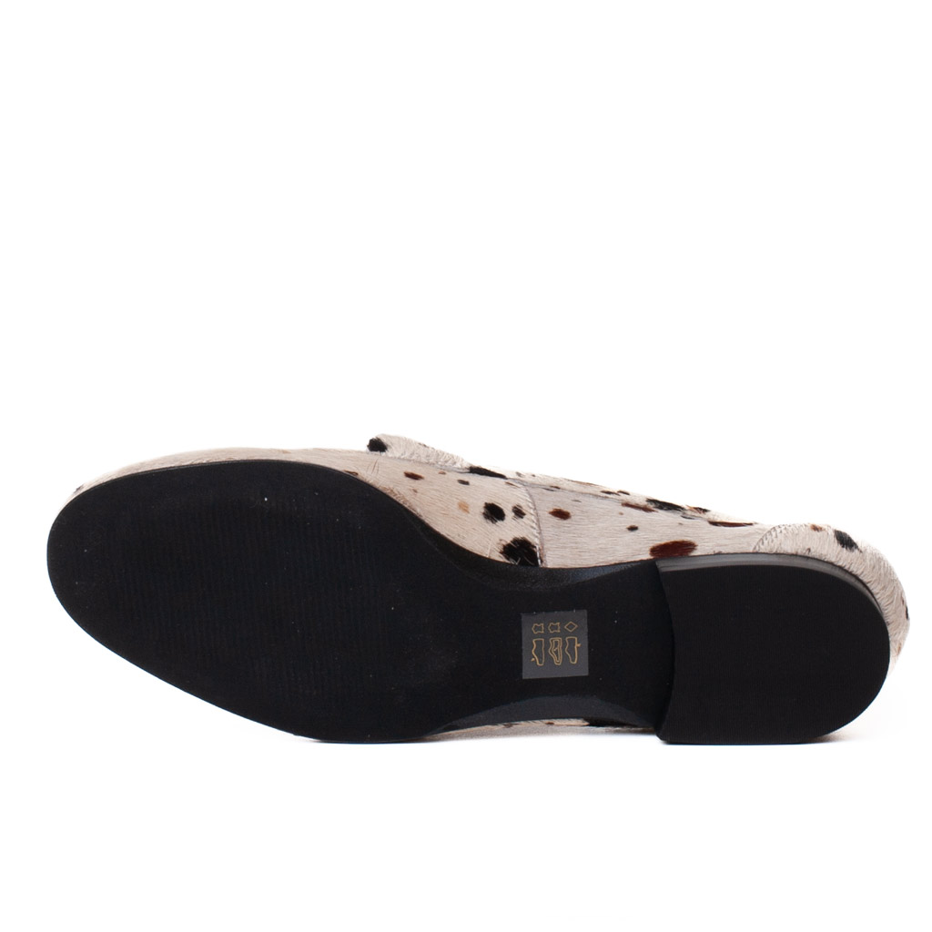 Cow-print pony-skin loafers with a gold clasp