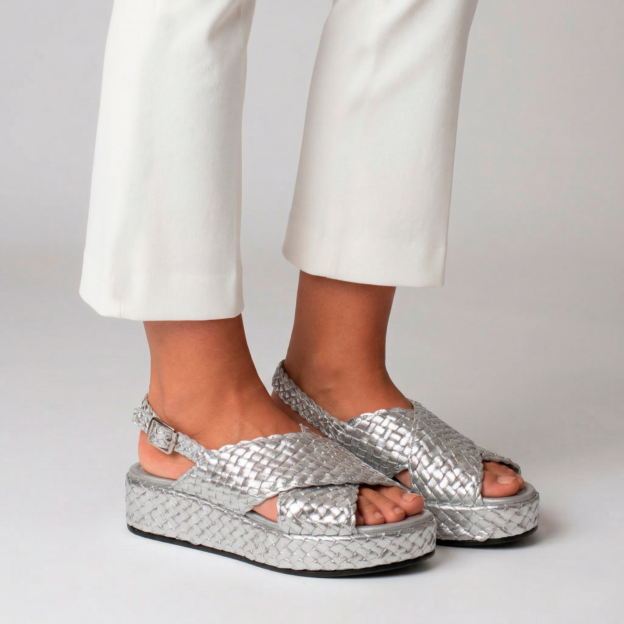 Silver woven leather sandals by Pons Quintana, Forlì